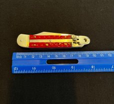 Hubertus Jigged Strawberry Red Bone Springer Lever Lock Automatic Knife