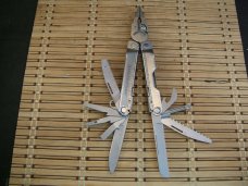 LEATHERMAN REBAR SILVER MULTI-TOOL PORTLAND OR. NICE CONDITION WITH LEATHERMAN VELCRO NYLON SHEATH