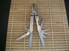 LEATHERMAN REBAR SILVER MULTI-TOOL PORTLAND OR. NICE CONDITION WITH LEATHERMAN VELCRO NYLON SHEATH