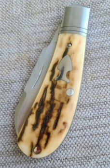 Jennings Raptor..Mammoth Ivory and Cpm154..Ringed bolsters..arrowhead shield..coa & box. 3.5"