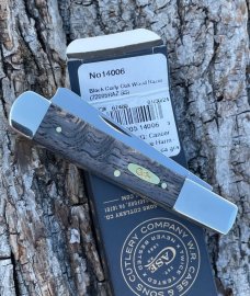 CASE XX ** 2024 SMOOTH BLACK CURLY OAK BRASS SHIELD RAZOR