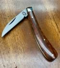 A Wright & Son "Ettrick" Carving Knife with Snakewood Handles and Curved Wharncliffe Blade