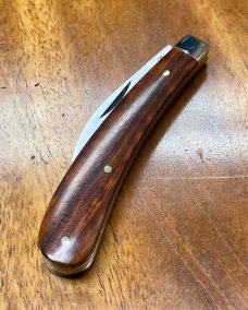 A Wright & Son "Ettrick" Carving Knife with Snakewood Handles and Curved Wharncliffe Blade