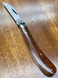 A Wright & Son "Ettrick" Carving Knife with Snakewood Handles and Curved Wharncliffe Blade