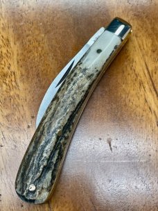 A Wright & Son "Ettrick" Carving Knife with Stag Handles and Curved Wharncliffe Blade