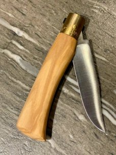 Antonini "Old Bear" Olive wood Outdoor knife with Clip Point blade and brass locking ring (M)