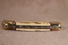 BUCK 110 2006 MAMMOTH IVORY WITH FACTORY FILE WORK