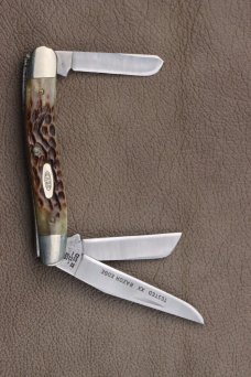 1985 CASE XX 6318SS MED. STOCKMAN JIGGED BONE SATIN BLADE FINISH