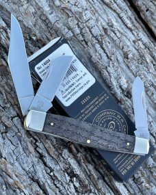 CASE XX ** 2024 SMOOTH BLACK CURLY OAK WOOD BRASS SHIELD LARGE STOCKMAN