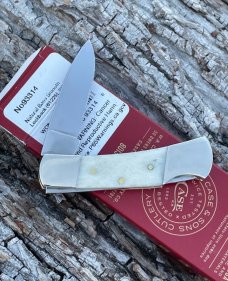 CASE XX ** FIRST PRODUCTION RUN 2024 NATURAL SMOOTH BONE XX OVAL SHIELD SMALL LOCKBACK