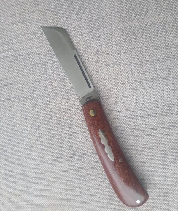 Menefee Lambsfoot Swayback..A2 steel..4" closed. .Crosscut Micarta scales...impressive swedge & pull