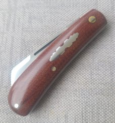 Menefee Lambsfoot Swayback..A2 steel..4" closed. .Crosscut Micarta scales...impressive swedge & pull