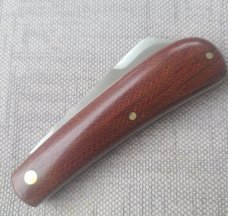 Menefee Lambsfoot Swayback..A2 steel..4" closed. .Crosscut Micarta scales...impressive swedge & pull