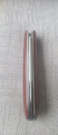 Menefee Lambsfoot Swayback..A2 steel..4" closed. .Crosscut Micarta scales...impressive swedge & pull