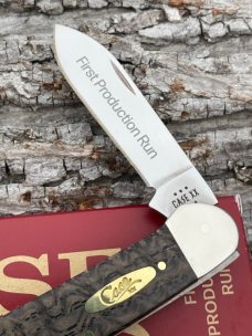 CASE XX ** 2024 FIRST PRODUCTION RUN SMOOTH BLACK CURLY OAK WOOD BRASS SHIELD CANOE