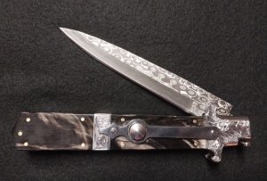 12" Picklock Switchblade with Damascus Blade and Buffalo horn handles.