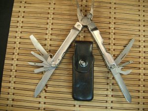 LEATHERMAN REBAR SILVER MULTI -TOOL USA VERY NICE USED CONDITION W17 TOTAL TOOLS AND LEATHER SHEATH