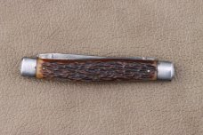 REMINGTON USA MUSKRAT RED BONE SCALES R4593
