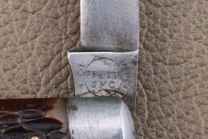 REMINGTON USA MUSKRAT RED BONE SCALES R4593