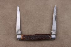 REMINGTON USA MUSKRAT RED BONE SCALES R4593