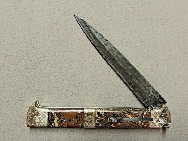 13" Double Eagle Picklock Switchblade. Damascus Blade and Multi Color Acrylic handles.