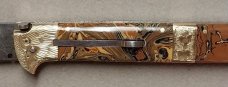 13" Double Eagle Picklock Switchblade. Damascus Blade and Multi Color Acrylic handles.