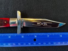 Schatt and Morgan Red Grooved Bone Swing Guard Cheetah Knife Queen 
