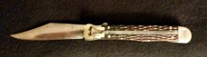 Case Tested 6161L Switchblade with Green Jigged Bone. 