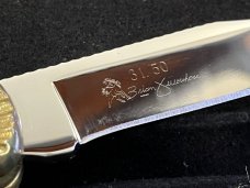 Brian Yellowhorse Customized Buck 110 Ltd Ed Navajo Inlaid "Texas Lone Star" LockBack Knife SN#31/50