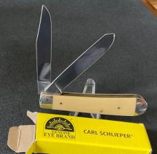 GERMAN EYE BRAND TRAPPER- YELLOW SYNTHETIC HANDLES.