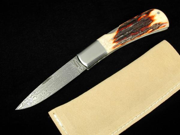 Al Warren Red Sambar Stag Drop Point Lock Back Knife Roseville CA. 3.75" Closed Damasteel Blade Al Warren Red Sambar Stag Drop Point Lock Back Knife Roseville CA. 3.75" Closed Damasteel Blade
