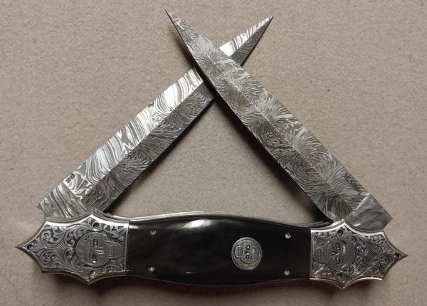Double Dagger Fighting Knife with Damascus Blades.