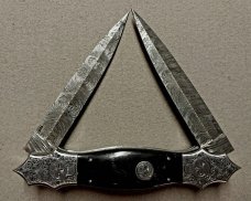 Double Dagger Fighting Knife with Damascus Blades.
