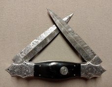 Double Dagger Fighting Knife with Damascus Blades.