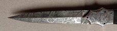 Double Dagger Fighting Knife with Damascus Blades.