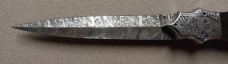 Double Dagger Fighting Knife with Damascus Blades.