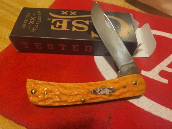 Case xx Persimmon  orange sod buster jr