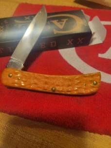 Case xx Persimmon  orange sod buster jr