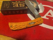 Case xx Persimmon  orange sod buster jr