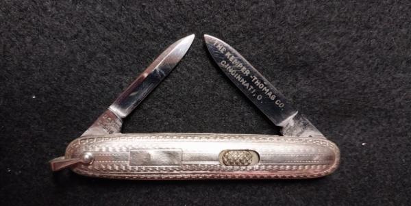 2 7/8" Flylock with etched blade and bail. 2 7/8" Flylock with etched blade and bail.