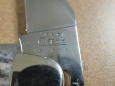 Case XX 2003 Black Bone Russlock Pattern # 61953 L SS