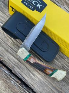 BUCK 110 FINGER GROOVE LEROY REMER CUSTOM AMBER STAG KNIFE