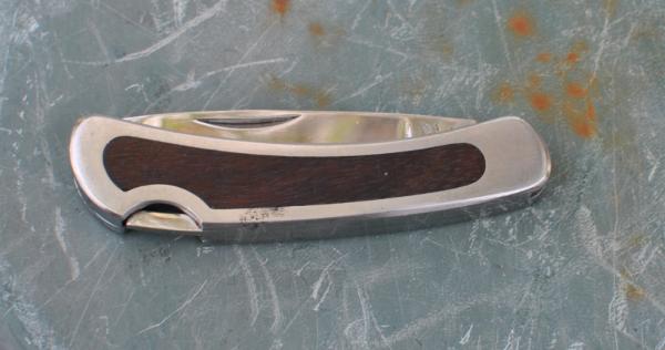 Kershaw 4 1/8" Rancher 2050 2 Blade One locks Stainless Rosewood Insert Mirror Polish Factory Edge Kershaw 4 1/8" Rancher 2050 2 Blade One locks Stainless Rosewood Insert Mirror Polish Factory Edge