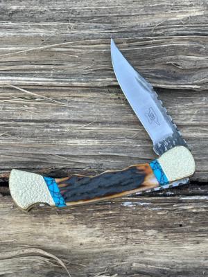 BUCK 110 FINGER GROOVE LEROY REMER CUSTOM AMBER STAG KNIFE