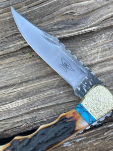 BUCK 110 FINGER GROOVE LEROY REMER CUSTOM AMBER STAG KNIFE