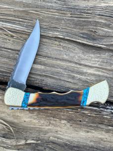 BUCK 110 FINGER GROOVE LEROY REMER CUSTOM AMBER STAG KNIFE
