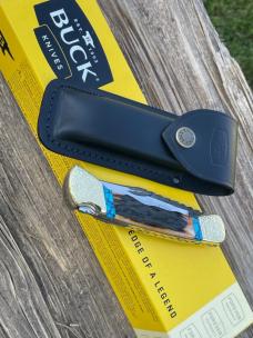 BUCK 110 FINGER GROOVE LEROY REMER CUSTOM AMBER STAG KNIFE