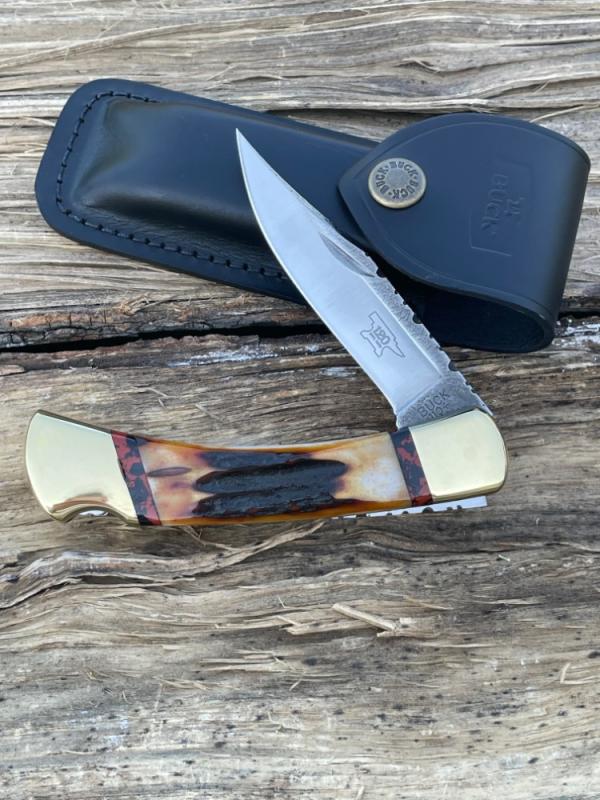 BUCK 110 LEROY REMER CUSTOM AMBER STAG KNIFE