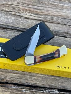 BUCK 110 LEROY REMER CUSTOM AMBER STAG KNIFE
