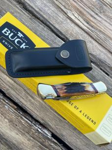 BUCK 110 LEROY REMER CUSTOM AMBER STAG KNIFE